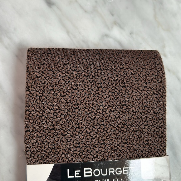 Brand new opaque leopard like tights purchased in Paris, France. NEVER USED. - Picture 2 of 4